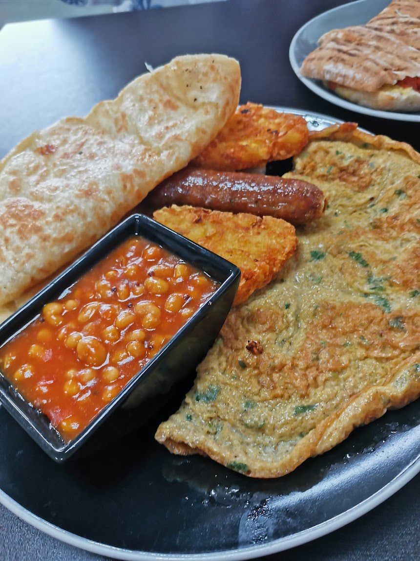 Guests enjoying breakfast at Desi Brunch Bolton